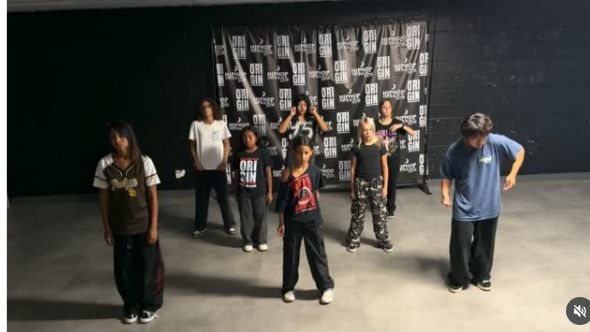 Eight dancers rehearsing together at The Origin